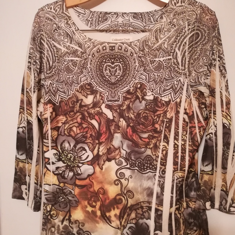 Three quarter length sleeve burnout top